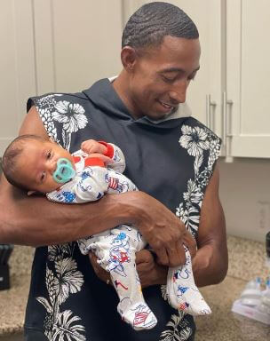 Perry Baker with his baby Braxtyn Blaze Baker.